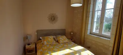 Un ou plusieurs lits dans un hébergement de l'établissement Chambre d'hôtes de l'Estrée