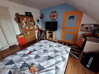 Télévision ou salle de divertissement dans l'établissement Chambre chez l'habitant