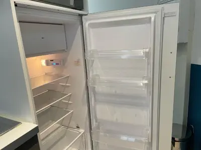 Cuisine ou kitchenette dans l'établissement Magnifique logement au pied du Château