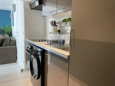 Cuisine ou kitchenette dans l'établissement Magnifique logement au pied du Château