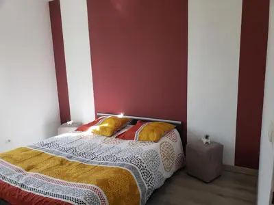 Un ou plusieurs lits dans un hébergement de l'établissement Chambres