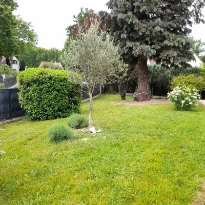 Jardin de l'établissement Chambre à 5 minutes du circuit