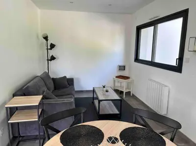 Coin salon dans l'établissement Appartement Le Mans proche du circuit des 24h