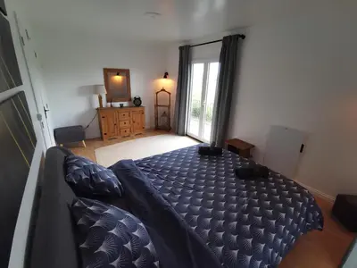 Un ou plusieurs lits dans un hébergement de l'établissement Grande maison détente & loisirs