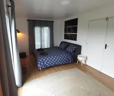 Un ou plusieurs lits dans un hébergement de l'établissement Grande maison détente & loisirs