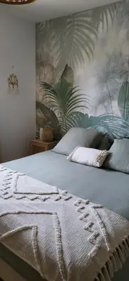 Un ou plusieurs lits dans un hébergement de l'établissement Chambres près du circuit