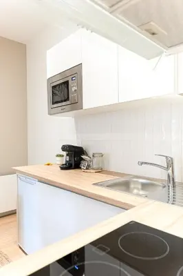 Cuisine ou kitchenette dans l'établissement Le naturel - Superbe logement - Extérieur privatif - Centre ville