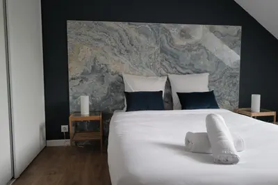 Un ou plusieurs lits dans un hébergement de l'établissement Balcon sur Loire