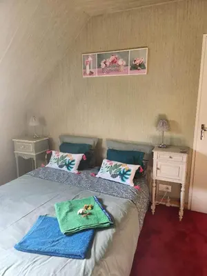 Un ou plusieurs lits dans un hébergement de l'établissement Etage maison, accès indépendant