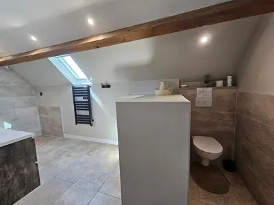 Salle de bains dans l'établissement Les Peupliers