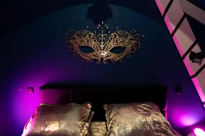 Un ou plusieurs lits dans un hébergement de l'établissement L'incognito - Romantisme - Vin - Jacuzzi