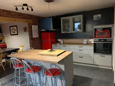 Cuisine ou kitchenette dans l'établissement Le 24’ Chrono
