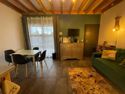 Coin salon dans l'établissement Appartement Plein Pied Arrow Wood La Flèche