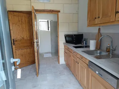 Cuisine ou kitchenette dans l'établissement Gîte de la Grand Maison le Noyer