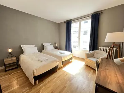 Un ou plusieurs lits dans un hébergement de l'établissement Villa Maignan 15 couchages 24h Le Mans