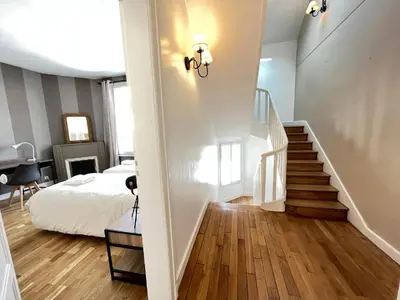 Un ou plusieurs lits dans un hébergement de l'établissement Villa Maignan 15 couchages 24h Le Mans
