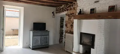 Télévision ou salle de divertissement dans l'établissement Maison de campagne