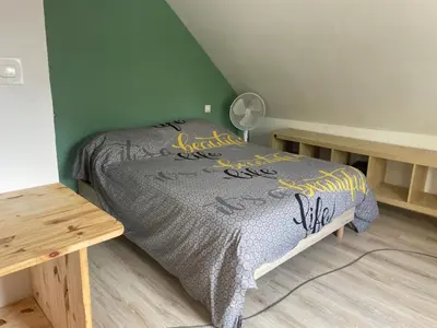 Un ou plusieurs lits dans un hébergement de l'établissement Maison Mimosa