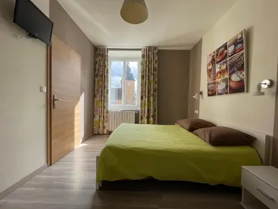 Un ou plusieurs lits dans un hébergement de l'établissement Auberge du Château
