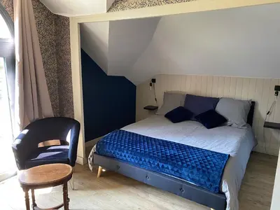 Un ou plusieurs lits dans un hébergement de l'établissement Le Castel de Bréhémont