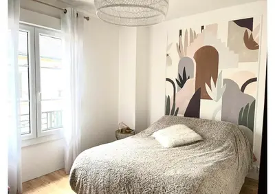Un ou plusieurs lits dans un hébergement de l'établissement Maison Cosy - Le Mans