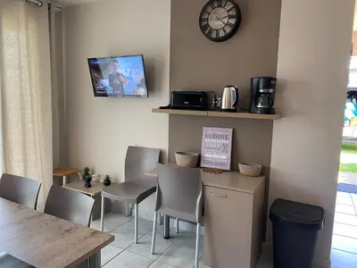 Télévision ou salle de divertissement dans l'établissement Richelieu et les mille châteaux