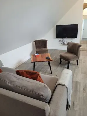 Télévision ou salle de divertissement dans l'établissement Appartement proche circuit