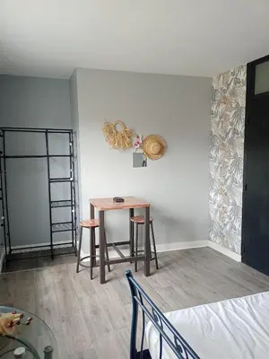 Un ou plusieurs lits dans un hébergement de l'établissement Appart 3 chambres