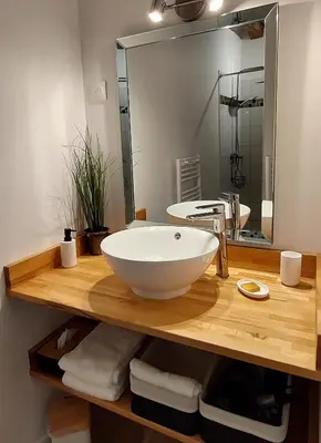 Salle de bains dans l'établissement Le Clos des Roses