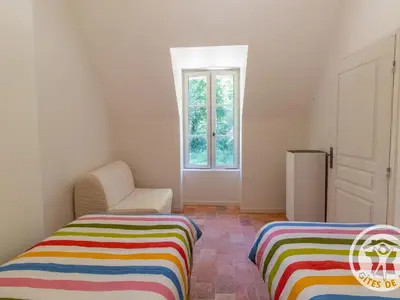 Un ou plusieurs lits dans un hébergement de l'établissement Gîte confortable au cœur du Maine-et-Loire, animaux admis - FR-1-622-58