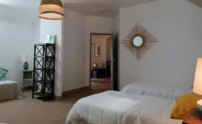 Un ou plusieurs lits dans un hébergement de l'établissement La Robinière Maison d'Hôtes