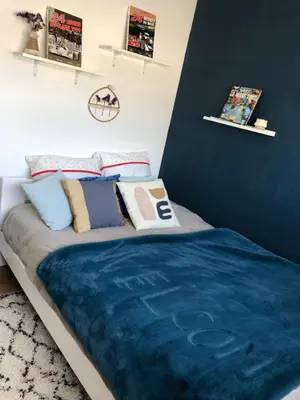 Un ou plusieurs lits dans un hébergement de l'établissement Chambre d hôte spéciale évènements sur circuit 24h du Mans