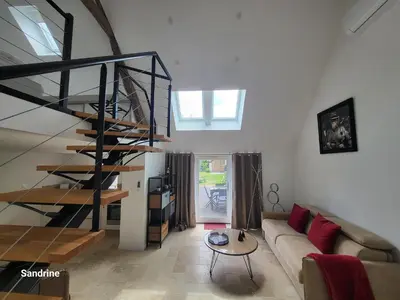 Coin salon dans l'établissement Le gîte Chez Lucie