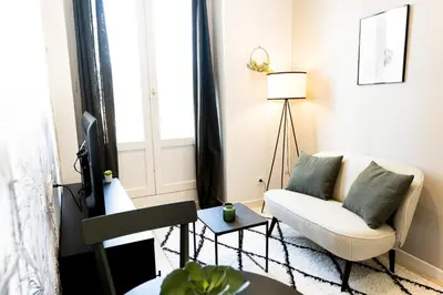 Coin salon dans l'établissement Le Tropical - Beau logement centre - Gare - Tram