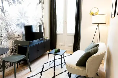 Télévision ou salle de divertissement dans l'établissement Le Tropical - Beau logement centre - Gare - Tram