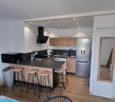 Cuisine ou kitchenette dans l'établissement Appartement T3 - Relax aux portes des 24h du Mans