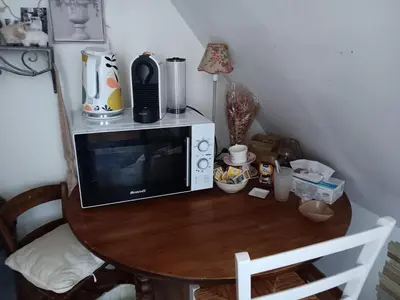 Cuisine ou kitchenette dans l'établissement Chambre d'hôtes 1