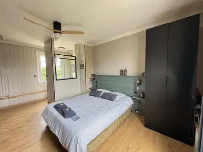 Un ou plusieurs lits dans un hébergement de l'établissement Oasis de Détente avec Piscine et Jacuzzi 300m2