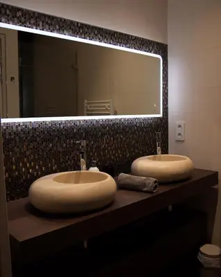 Salle de bains dans l'établissement Bords de Sarthe