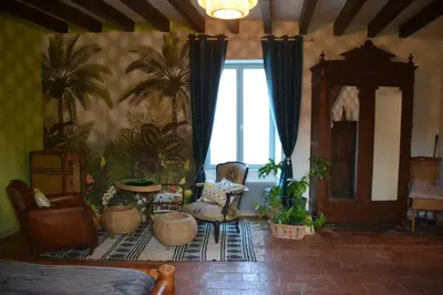 Coin salon dans l'établissement La Petite Ferme