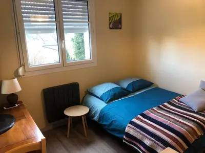 Un ou plusieurs lits dans un hébergement de l'établissement Appartement plein centre Le Mans