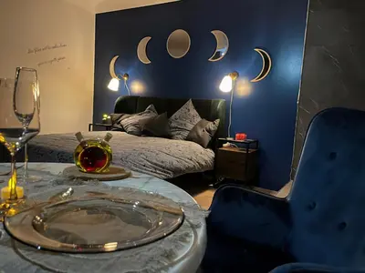 Un ou plusieurs lits dans un hébergement de l'établissement Sauna & Détente - Suite Privée - Tours - Netflix
