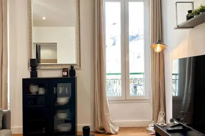 Télévision ou salle de divertissement dans l'établissement Le New York Appart' T1 Bis au centre du MANS