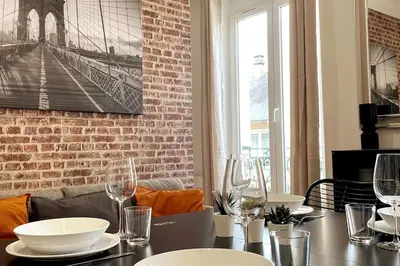 Coin salon dans l'établissement Le New York Appart' T1 Bis au centre du MANS
