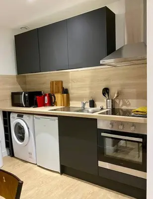 Cuisine ou kitchenette dans l'établissement Le Marrakech Appart' T1 au centre du Mans