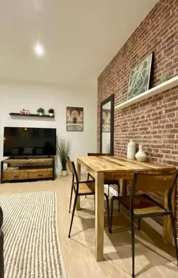 Coin salon dans l'établissement Le Marrakech Appart' T1 au centre du Mans