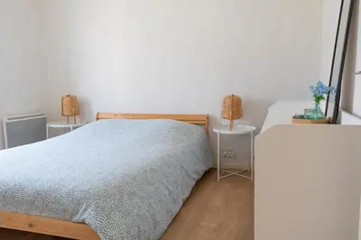 Un ou plusieurs lits dans un hébergement de l'établissement Charmant appartement - 5 mn Zoo de Beauval 4p