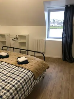 Un ou plusieurs lits dans un hébergement de l'établissement À côté de la Loire