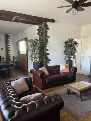 Coin salon dans l'établissement Maison typique Maillé