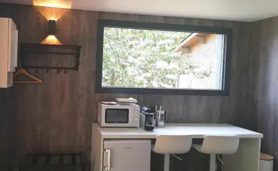 Cuisine ou kitchenette dans l'établissement Les INSOLITES DE LA TOUCHE